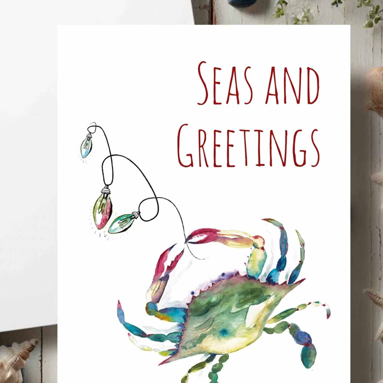 Beach Christmas cards zoomed designed with a watercolor blue crab by Victoria Grigaliunas of Do Tell A Belle a small business in Palm Beach Gardens Florida
