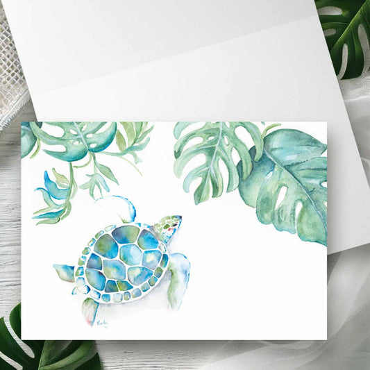 Watercolor sea turtle notecard with monstera palm leaves in turquoise blue and green, folded 4.25 x 5.5 blank card by Do Tell A Belle — tropical beach stationery and thank you card design.