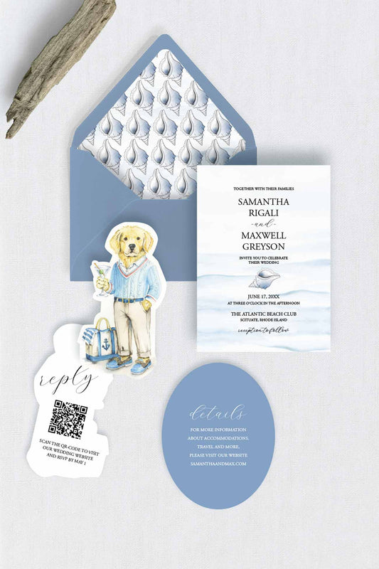 A coordinated nautical-themed wedding stationery set laid flat on a light textured background, including a blue envelope with a white patterned insert, a white invitation card with blue beach illustration, a blue oval detail card, a white reply card with QR code, and a small dog-shaped tag.