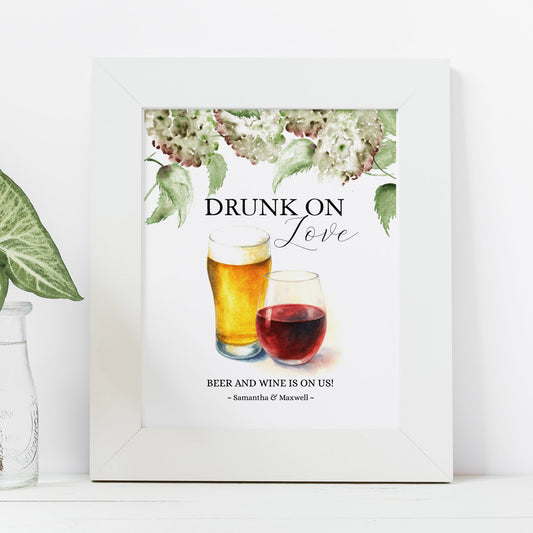 green hydrangea wedding decorations features a printable custom beer and wine bar sign with a top boarder of watercolor florals in shades of green, white and antique.