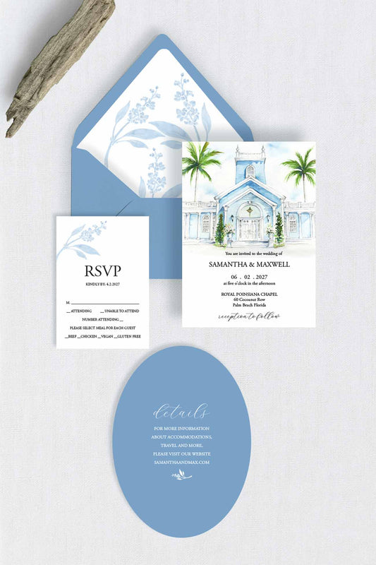 A coordinated wedding stationery set arranged on draped cream fabric, including a watercolor painting of the Royal Poinciana Chapel with palm trees invitation card with blue watercolor envelope, an RSVP card with blue floral print, a die cut blue oval details card, and a wood branch prop.