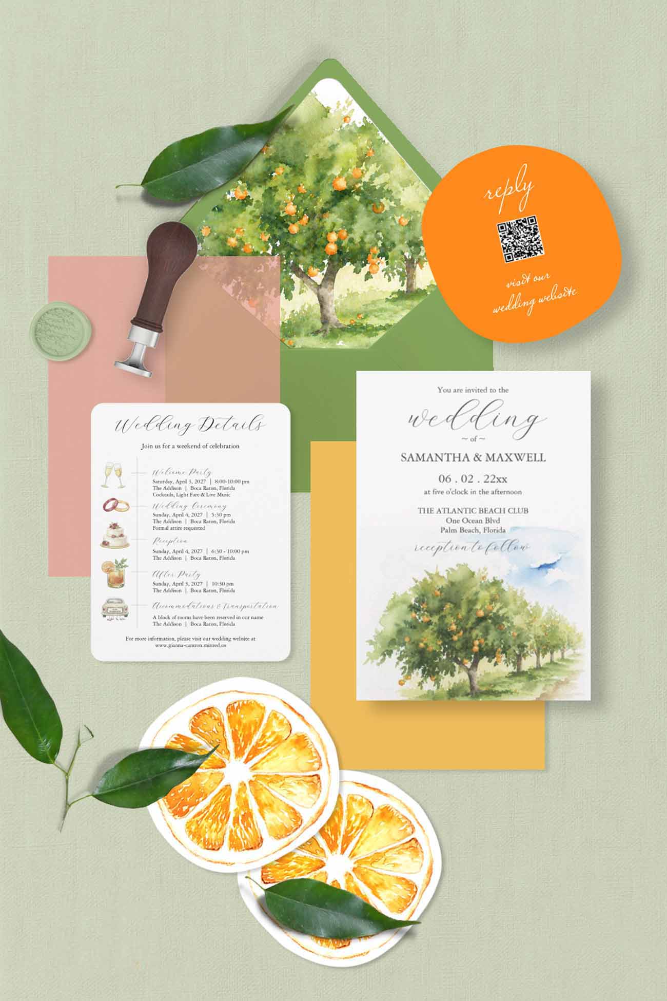 A styled watercolor wedding invitation suite under $90 flat lay on a pale sage green background, featuring a white invitation card with watercolor orange tree artwork, a die cut watercolor orange circular reply card, a vellum overlay, a green envelope with orange grove envelope liner, and a wedding timeline style details card. Also included are orange slices, leaves, and a small wooden stamp.